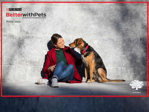 Better with pets prize woman sat with dog